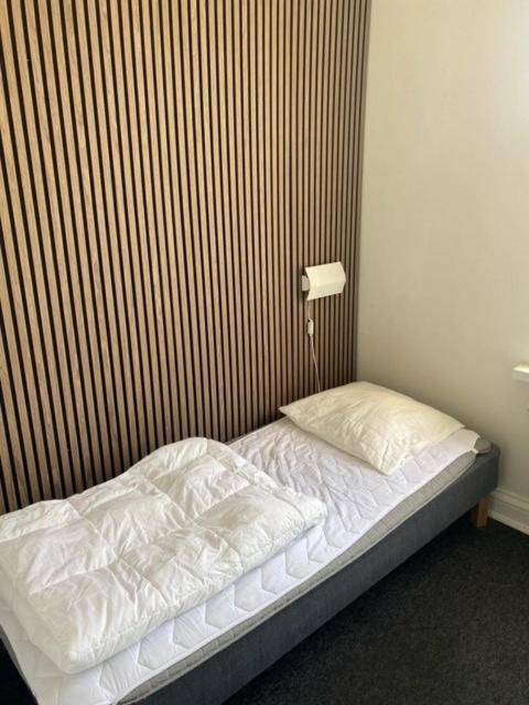 Danhostel Odense City Zewnętrze zdjęcie A bed with a duvet